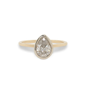 
                  
                    Load image into Gallery viewer, Front view of a bezel set, pear cut, salt and pepper diamond solitaire ring cast in 14 kt yellow gold by King + Curated.
                  
                