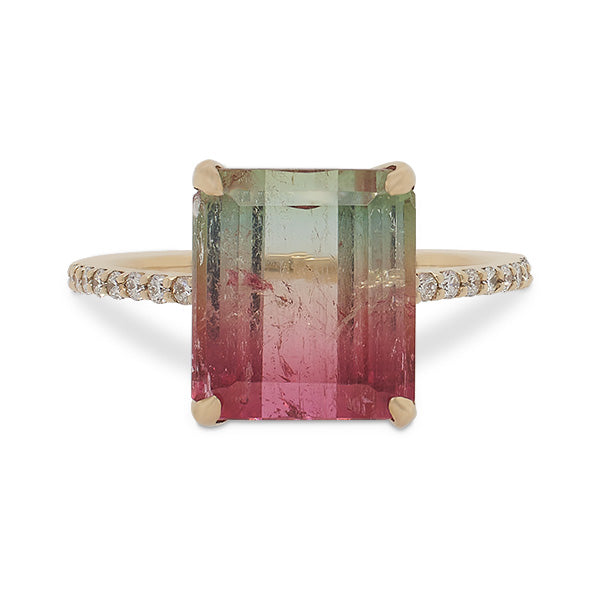 Front view of a large emerald cut watermelon tourmaline and diamond ring cast in 14 kt yellow gold by King + Curated in Beacon, NY.