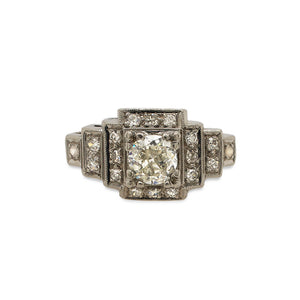 
                  
                    Load image into Gallery viewer, Front view of an Edwardian Deco style ring made of platinum with just under a half carat old euro cut center diamond that is surrounded by 0.27 tcw of single cut round diamonds.
                  
                