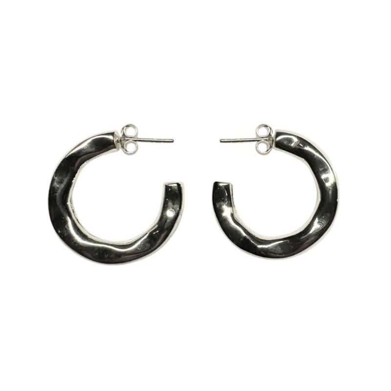 3/4 organic style hoop earrings with posts made of sterling silver on white background