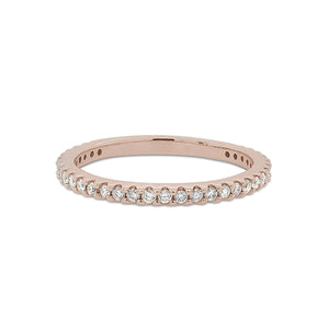
                  
                    Load image into Gallery viewer, Front view of a 3/4 diamond eternity band set with round cut diamonds in a 14 kt rose gold setting.
                  
                