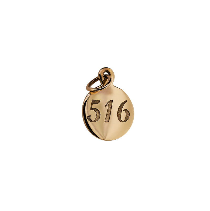 Front view of engraved area code pendant with "516". Pendant is 14kt yellow gold and 9.3mm.