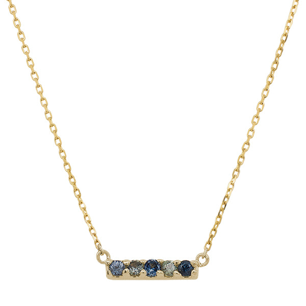 Front view of a bar necklace with 5 round cut green and blue sapphires in a 14 kt yellow gold setting by King + Curated.
