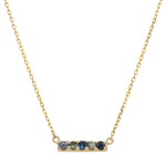 Front view of a bar necklace with 5 round cut green and blue sapphires in a 14 kt yellow gold setting by King + Curated.