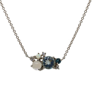
                  
                    Load image into Gallery viewer, Front view of a round cut aquamarine, moonstone, blue topaz, opal, and diamond cluster necklace cast in 14 kt white gold.
                  
                