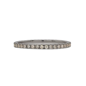 
                  
                    Load image into Gallery viewer, Front view of a classic diamond eternity band with a 0.47 tcw. of round cut diamonds cast in 14 kt white gold.
                  
                