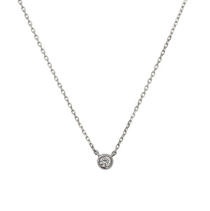 
                  
                    Load image into Gallery viewer, Front view of a bezel set diamond solitaire pendant necklace cast in 14 kt white gold.
                  
                