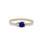 Front view of blue lapis and diamond ring cast in 14 kt yellow gold.