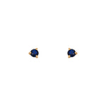 Round Cut Blue Sapphire Studs set in 14 kt yellow gold with three prongs. Displayed on a white background. 