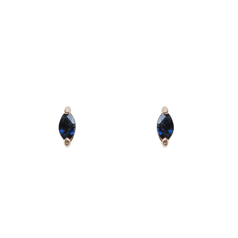 Front view of marquise cut, dark blue sapphire stud earrings set in 14 kt yellow gold two prong settings. Displayed on a white background.