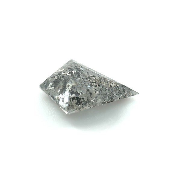 View of 1.31 ct. kite cut salt and pepper diamond on white background.