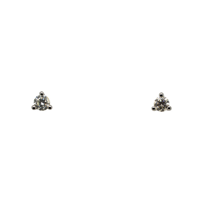 Front view of a pair of 0.28 tcw, round cut diamond studs in a 14 kt white gold, 3 prong martini setting.