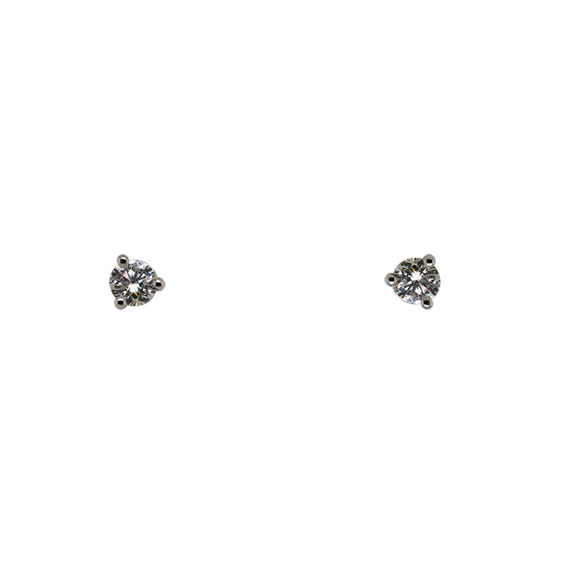 Front view of a pair of 0.50 tcw, round cut diamond studs in a 14 kt white gold, 3 prong martini setting.