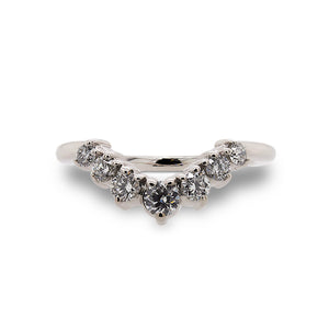
                  
                    Load image into Gallery viewer, Front view of shadow band with 7 round cut diamonds increasing in size from the outside in, set in 14 kt white gold.
                  
                