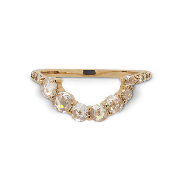 Front view of asymmetrical, rose cut diamond shadow band with 7 rose cut diamonds and 10 round cut diamonds set in 14 kt yellow gold.