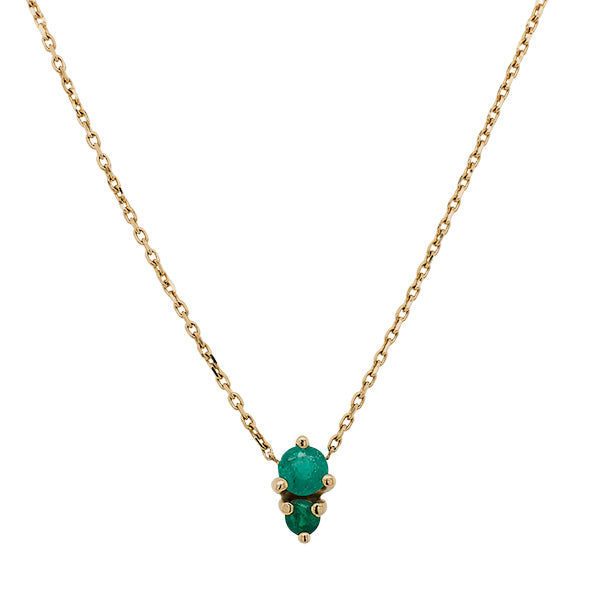 Front view of a double emerald necklace cast in a 14 kt yellow gold north south setting.