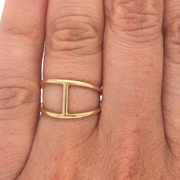
                  
                    Load image into Gallery viewer, Double band bar ring cast in 14 kt yellow gold on left ring finger.
                  
                