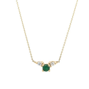 
                  
                    Load image into Gallery viewer, Front view of a round cut double diamond and round cut emerald pendant necklace cast in 14 kt yellow gold.
                  
                