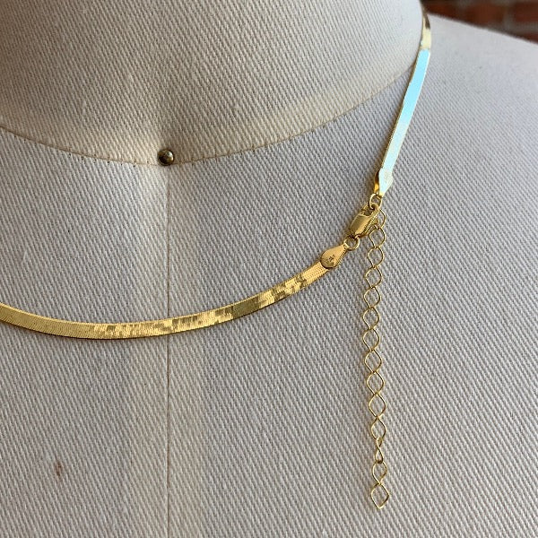 
                  
                    Load image into Gallery viewer, View of lobster clasp of 14k gold herringbone chain with 2&amp;quot; extender chain
                  
                