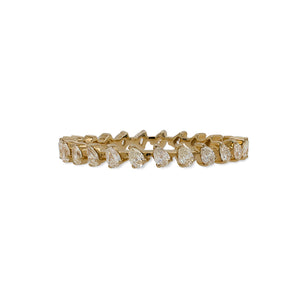 
                  
                    Load image into Gallery viewer, Front view of an eternity band with a 0.67 tcw of pear cut diamonds cast in 14 kt yellow gold.
                  
                