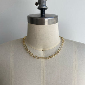 
                  
                    Load image into Gallery viewer, Front view of paperclip chain on dress form with a 7 round link pattern between each paperclip  link.  Shown in 14kt yellow gold and approx 16&amp;quot; length.
                  
                