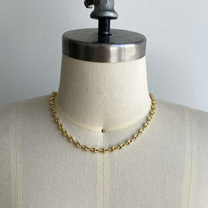 
                  
                    Load image into Gallery viewer, Front view of small 16&amp;quot; mariner chain on dress form. Cast in 14kt yellow gold.
                  
                