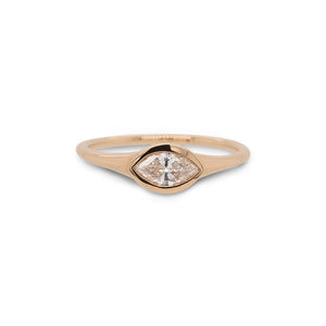 
                  
                    Load image into Gallery viewer, Front view of bezel set, marquise cut diamond ring set in 14 kt yellow gold.
                  
                