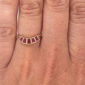 
                  
                    Load image into Gallery viewer, Modern ruby ring with 5 bezel set rubies set in 14 kt yellow gold on left ring finger.
                  
                
