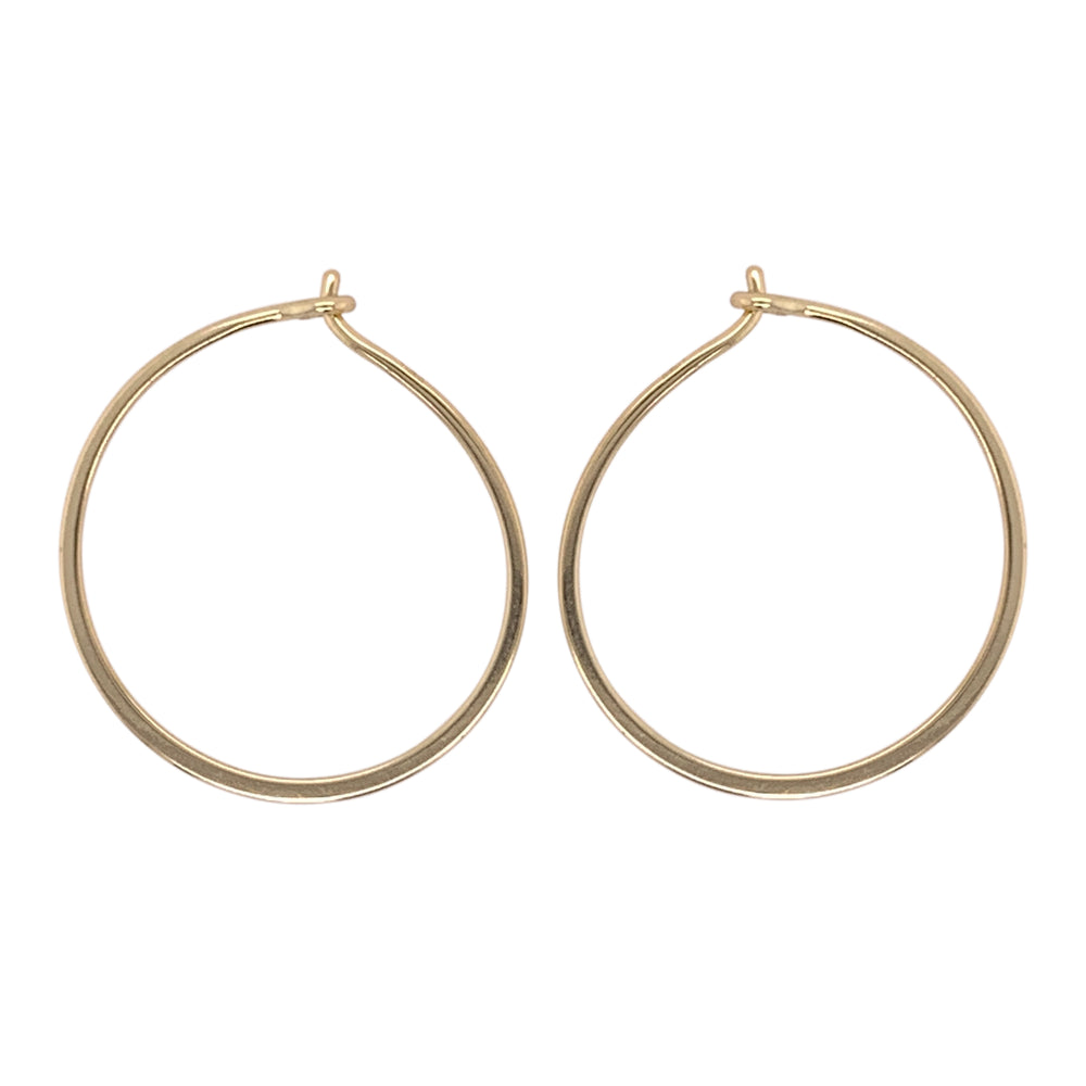 
                  
                    Load image into Gallery viewer, Modern, thin hoop earrings measuring at 24.5 mm.  Made of 925 sterling silver with 14kt yellow gold vermeil.  Displayed side facing on a white background.
                  
                