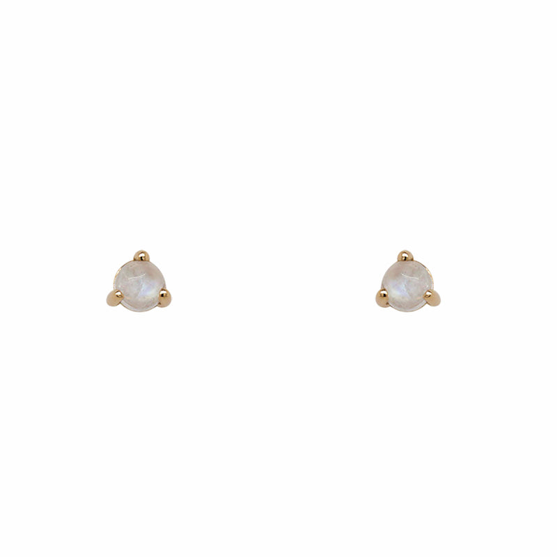 Cabochon Moonstone set in 14 kt yellow gold with three prongs. Displayed on white background.
