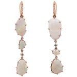 Opal And Diamond Drop Earrings Set in 14 kt Yellow Gold. Displayed on a white background.
