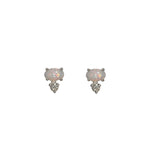 Front view of white oval opals, set east-west in 14 kt white gold with 1 round accent diamond set vertically below each.