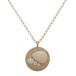 
                  
                    Load image into Gallery viewer, Front view of a cabochon cut opal and triple round cut diamond pendant necklace made of solid 14 kt yellow gold.
                  
                