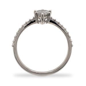 
                  
                    Load image into Gallery viewer, Side view of a pear cut, salt and pepper diamond ring flanked by 16 round cut diamonds, and cast in 14 kt white gold by King + Curated.
                  
                