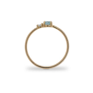 
                  
                    Load image into Gallery viewer, Side view of round cut blue zircon and diamond ring cast in 14 kt yellow gold.
                  
                
