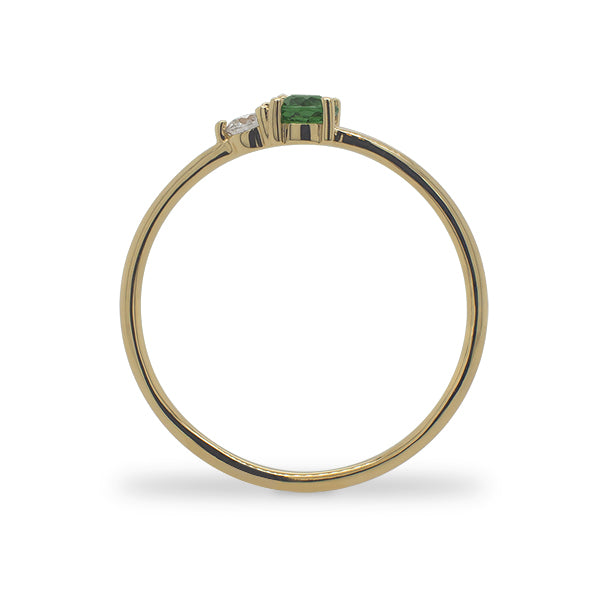 
                  
                    Load image into Gallery viewer, Side view of a round cut green tourmaline and diamond ring cast in 14 kt yellow gold.
                  
                