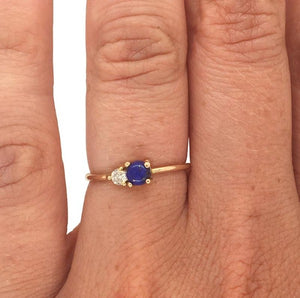 
                  
                    Load image into Gallery viewer, Blue lapis and diamond ring cast in 14 kt yellow gold on left ring finger.
                  
                