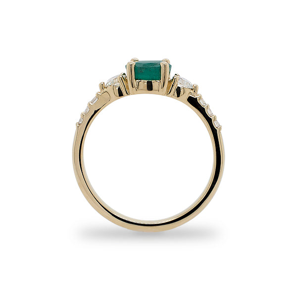 
                  
                    Load image into Gallery viewer, Side view of round emerald ring with 2 medium and 6 small accent diamonds cast in 14 kt yellow gold.
                  
                