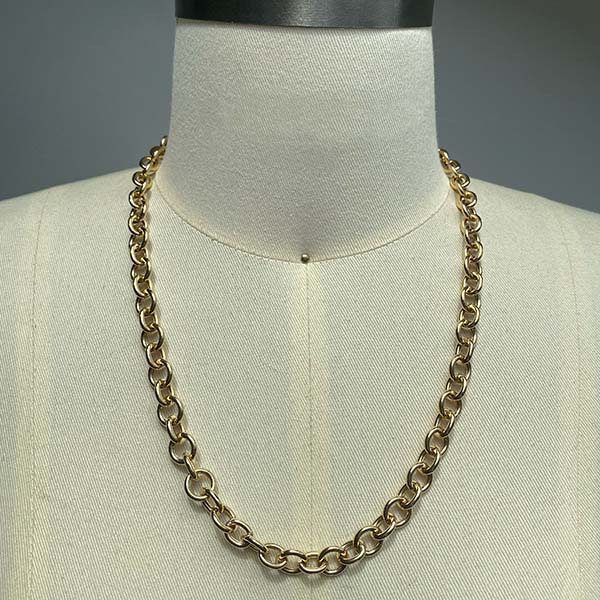 Front view on dress form of medium round link chain necklace in 14kt yellow gold. 20" length shown.