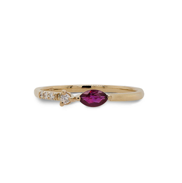 Front view of marquise cut ruby and diamond ring cast in 14 kt yellow gold.