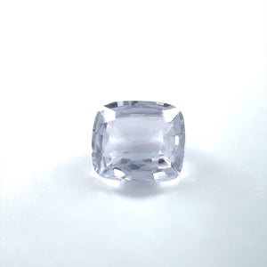 
                  
                    Load image into Gallery viewer, Front view of a 1.30 ct. cushion cut pale lilac sapphire on white background.
                  
                