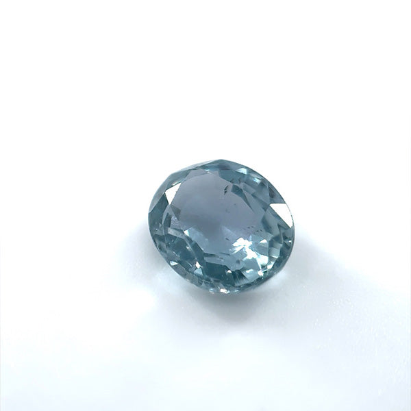 
                  
                    Load image into Gallery viewer, Angled view of a 1.68 ct. blue oval sapphire on white background
                  
                