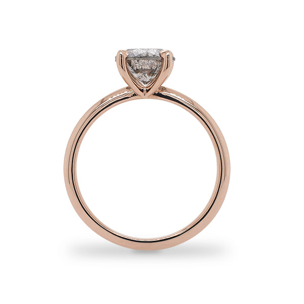 Side view of 1.46 ct salt and pepper diamond solitaire band cast in 14 kt rose gold. 