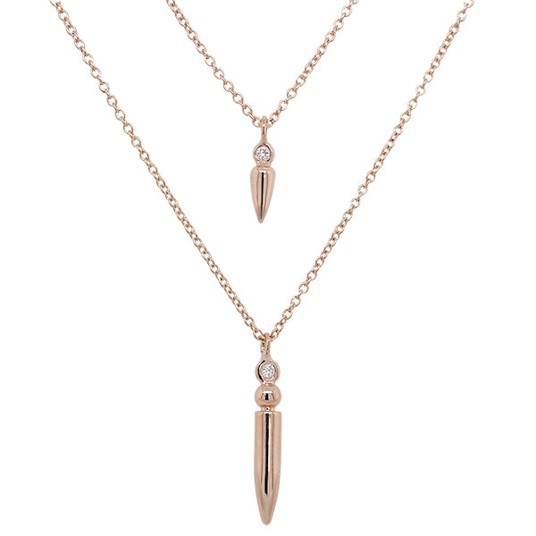 Front view of one small diamond spike necklace and one large diamond spike necklace cast in 14 kt rose gold.