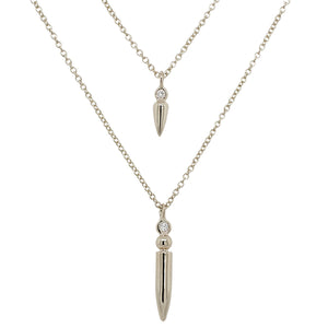 
                  
                    Load image into Gallery viewer, Front view of one small diamond spike necklace and one large diamond spike necklace cast in 14 kt white gold.
                  
                