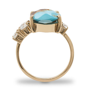 
                  
                    Load image into Gallery viewer, Side view of an asymmetrical rose cut turquoise ring flanked by 3 rose cut diamonds cast in 14 kt yellow gold by King + Curated.
                  
                