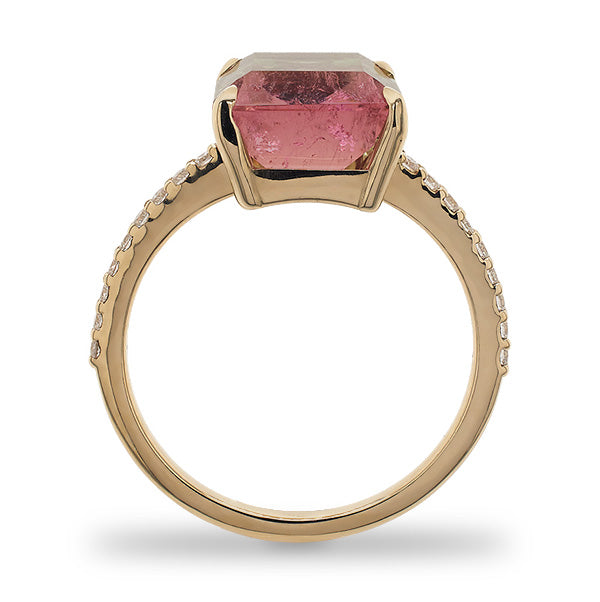 Side view of a large emerald cut watermelon tourmaline and diamond ring cast in 14 kt yellow gold by King + Curated in Beacon, NY.